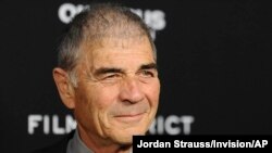 FILE - Robert Forster arrives at the premiere of "Olympus Has Fallen" in Los Angeles, March 18, 2013. Forster, the handsome character actor who got a career resurgence and Oscar-nomination for playing bail bondsman Max Cherry in "Jackie Brown," has died