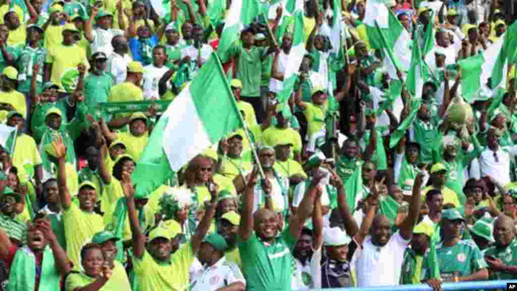 Nigeria&#39;s supporters cheer during a world cup qualifying playoff match in Calabar, Nigeria, Saturday, Nov. 16, 2013.