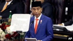 FILE - Indonesia's President Joko Widodo delivers his state of the nation address ahead of the country's Independence Day at the parliament building in Jakarta, Indonesia, Aug. 16, 2019.