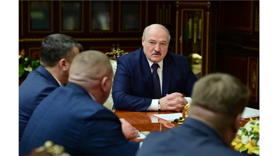 FILE - Belarusian President Alexander Lukashenko attends a meeting with top officials in Minsk, Jan. 26, 2021.