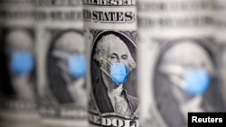 Gambar George Washington menggunakan masker pada lembaran uang dollar Amerika dalam foto ilustrasi, 31 Maret 2020.