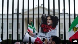 FILE - Demonstrators rally outside the White House to protest against the Iranian regime, in Washington, Oct. 22, 2022.