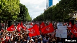 Tunisian's protesting economic hardships and calling for President Kais Saied to resign, October 15, 2022.