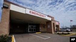 Patients can enter the Alliance Healthcare System hospital in Holly Springs, Mississippi, only through the emergency room and the small admittance office at the side after the facility transitioned to a rural emergency hospital.