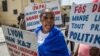 FILE - Haitians demonstrate in Port-au-Prince on Aug. 10, 2021, during a protest organized by human rights lawyers in front of the Ministry of Justice to demand the release of political prisoners and the scheduling of criminal trials. 