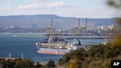 FILE - An oil tanker is moored at the Sheskharis complex, part of Chernomortransneft JSC, a subsidiary of Transneft PJSC, in Novorossiysk, Russia, on Oct. 11, 2022.