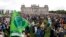 Activist gather for a Fridays for Future global climate strike in front of the parliament building in Berlin, Germany, Sept. 24, 2021. 