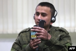 A POW from Nepal speaks during a press conference in Kyiv, on March 15, 2024.