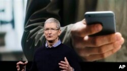 Apple CEO Tim Cook speaks at an event to announce new products at Apple headquarters, Monday, March 21, 2016, in Cupertino, Calif. (AP Photo/Marcio Jose Sanchez)