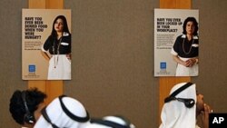 Kuwaiti journalists attend a Human Rights Watch press conference in Kuwait City announcing a new report that shows abuse of domestic workers in Kuwait is rising, and maids in the Gulf emirate face prosecution when they try to escape, 6 Oct 2010 (file phot