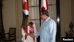 Canadian Foreign Minister Chrystia Freeland shakes hands with her Cuban counterpart Bruno Rodriguez during a meeting in Havana, Cuba August 28, 2019. 