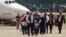 Los inmigrantes deportados, entre ellos niños y mujeres llegaron al aeropuerto internacional de La Aurora en Guatemala.
