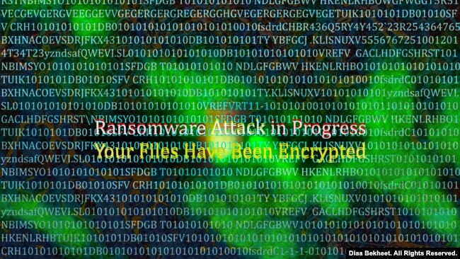 An illustration of a ransomware attack is seen on a computer screen. (Graphic by Diaa Bekheet)