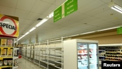 Empty shelves are seen after customers stocked up on toilet paper during swirling fears around the coronavirus in Sydney, Australia, March 6, 2020.