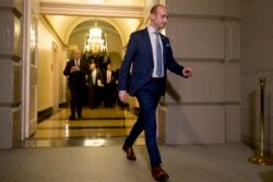 FILE - Senior Trump adviser Stephen Miller arrives for a meeting with the president on Capitol Hill in Washington, June 19, 2018.