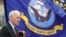 FILE - Navy Secretary Richard Spencer delivers a speech at the U.S. Naval base in Yokosuka, southwest of Tokyo, July 12, 2018. A federal judge in Connecticut certified a class-action lawsuit Thursday against Spencer.