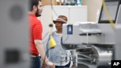 Broward County Supervisor of Elections, Brenda Snipes, walks through the vote count room during an election recount, Nov. 11, 2018, in Lauderhill, Florida