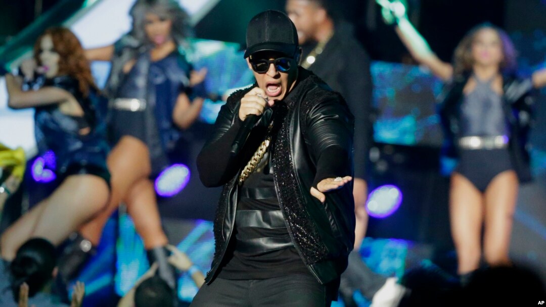 FILE - Singer Daddy Yankee performs during the Latin Billboard Awards in Coral Gables, Florida, April 28, 2016.