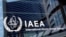 FILE: The logo of the International Atomic Energy Agency is seen at IAEA headquarters during a board of governors meeting in Vienna, Austria. Taken June 7, 2021