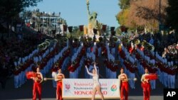 FILE - The Pasadena City College marching band performs at the 131st Rose Parade in Pasadena, Calif., Jan. 1, 2020.