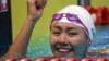 Liu Xiang merayakan kemenangan dalam final renang nomor 50 meter gaya punggung putri di Asian Games, Jakarta, 21 Agustus 2018.