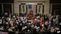 FILE - In this image from video provided by House Television, House Speaker Paul Ryan stands at the podium as he brings the House of Representatives into session, June 22, 2016, in Washington.