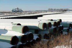 FILE - A depot used to store pipes for TransCanada Corp.'s planned Keystone XL oil pipeline is seen in Gascoyne, North Dakota, Nov. 14, 2014.