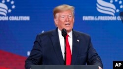 President Donald Trump speaks at the Faith & Freedom Coalition conference in Washington, June 26, 2019. 