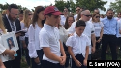 Friends and family gathered at the grave of Alyssa Alhadeff to unveil her tombstone in the Star of David Memorial Garden Cemetery in Fort Lauderdale, Florida, May 1, 2018.