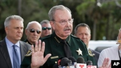 FILE - Palm Beach County Sheriff Ric Bradshaw speaks to reporters regarding the vehicle that breached security at President Donald Trump's Mar-a-Lago resort in Palm Beach, Fla., Jan. 31, 2020.