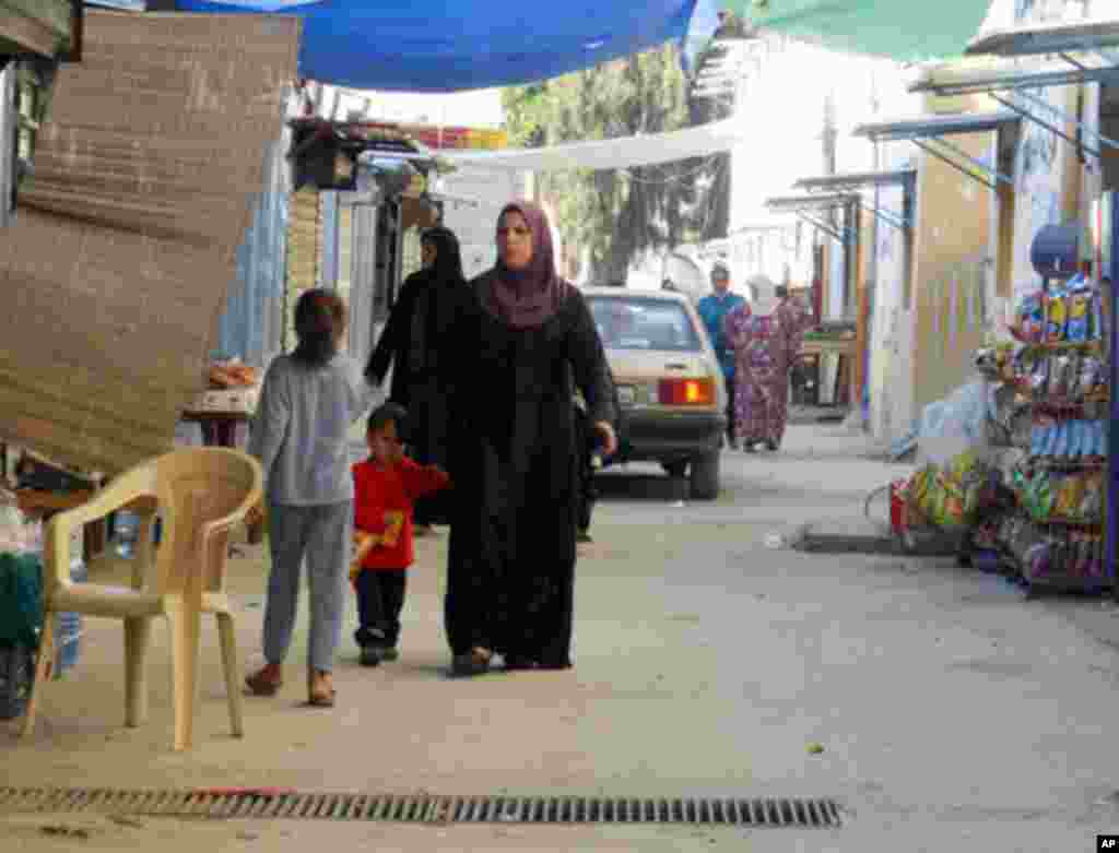 Families say in the over-crowded temporary housing, their children are often sick.