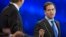 Marco Rubio, right, and Jeb Bush, argue a point during the CNBC Republican presidential debate at the University of Colorado, Wednesday, Oct. 28, 2015.
