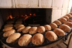 Freshly baked bread cools at a bakery in Beirut, Lebanon June 30, 2020.