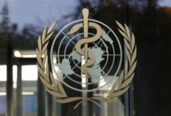 FILE - A logo is pictured on the World Health Organization (WHO) headquarters in Geneva, Switzerland, Nov. 22, 2017.
