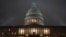 FILE - The U.S. Capitol in Washington is shrouded in mist, Dec. 13, 2019, at the end of an acrimonious week of partisan disputes in the House Judiciary Committee, which approved two articles of impeachment against President Donald Trump.