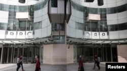 FILE - The main entrance to the BBC headquarters and studios in Portland Place, London, Britain, July 16, 2015.