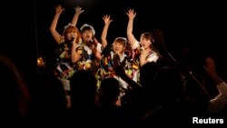 Members of pop group Pottya perform at a live theatre in Tokyo, Japan, Nov.10, 2016. 