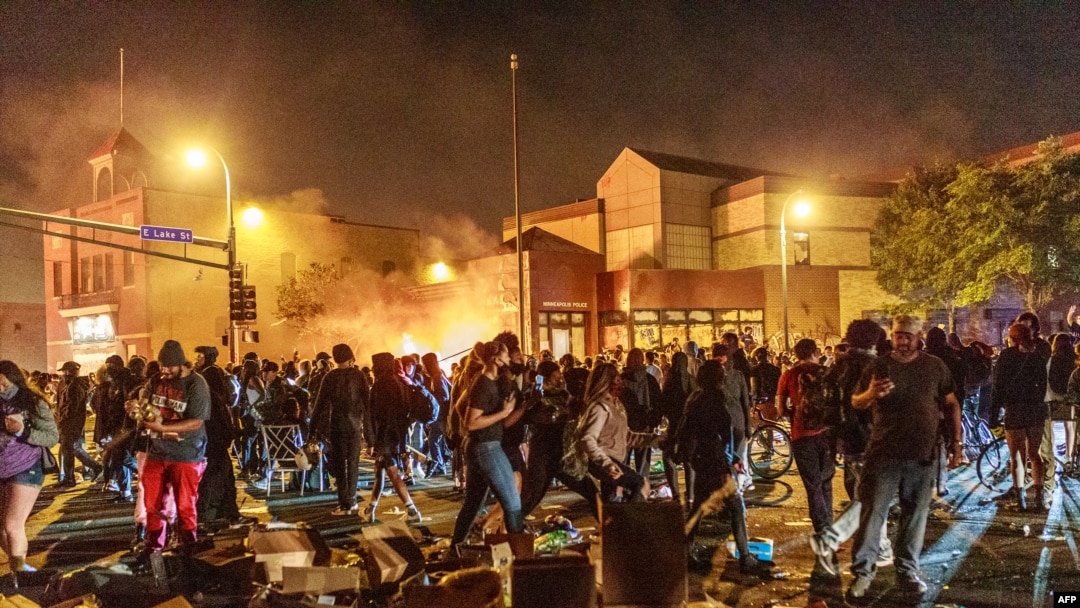 George Floyd protesters set Minneapolis police station afire