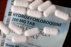 FILE - This April 6, 2020 photo shows an arrangement of Hydroxychloroquine pills in Las Vegas.