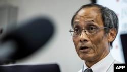 FILE - CEO of Hong Kong Public Opinion Research Institute Robert Chung speaks during a press conference in Hong Kong on July 27, 2023.