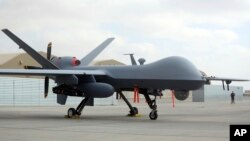 FILE - A U.S. MQ-9 drone is seen at Kandahar Airfield, Afghanistan, Jan. 23, 2018. 