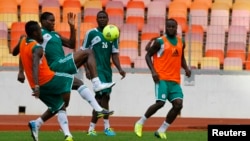 Members of the Super Eagles, Nigeria's national team, train in Abuja October 10, 2013 before World Cup qualifier against Ethiopia.