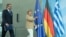 Greek Prime Minister Antonis Samaras (l) and German Chancellor Angela Merkel in Berlin, Aug 24, 2012.