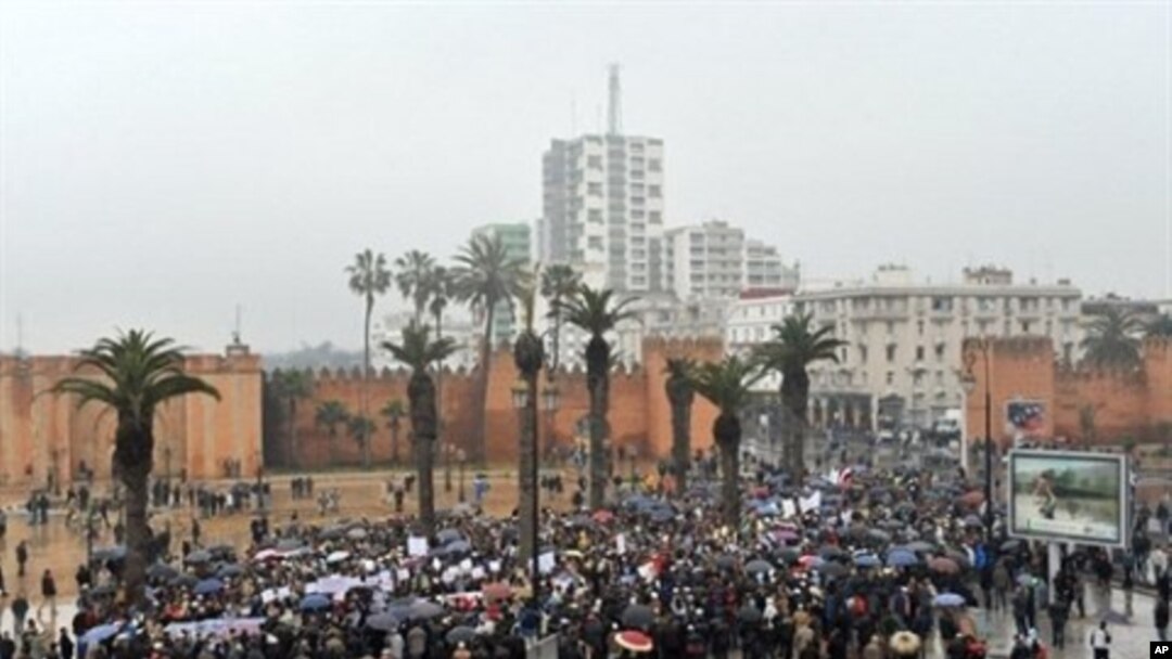 Moroccans gather during a protest demanding broad political reforms in Morocco in Rabat, February 20, 2011