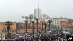 Moroccans gather during a protest demanding broad political reforms in Morocco in Rabat, February 20, 2011