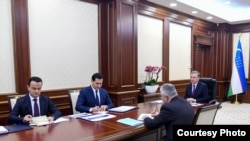 FILE - Uzbek President Shavkat Mirziyoyev, far right, meets with investment officials in Tashkent, Feb. 24, 2020. (president.uz)