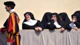 Nuns stand at St. Peter&#39;s Square at the Vatican at the end of the Pope&#39;s weekly general audience.