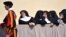 Nuns stand at St. Peter's Square at the Vatican at the end of the Pope's weekly general audience.
