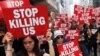 Thousands Wear Black, Rally to Demand Hong Kong Leader Goes