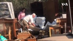 Evicted Farmer Packing His Belongings